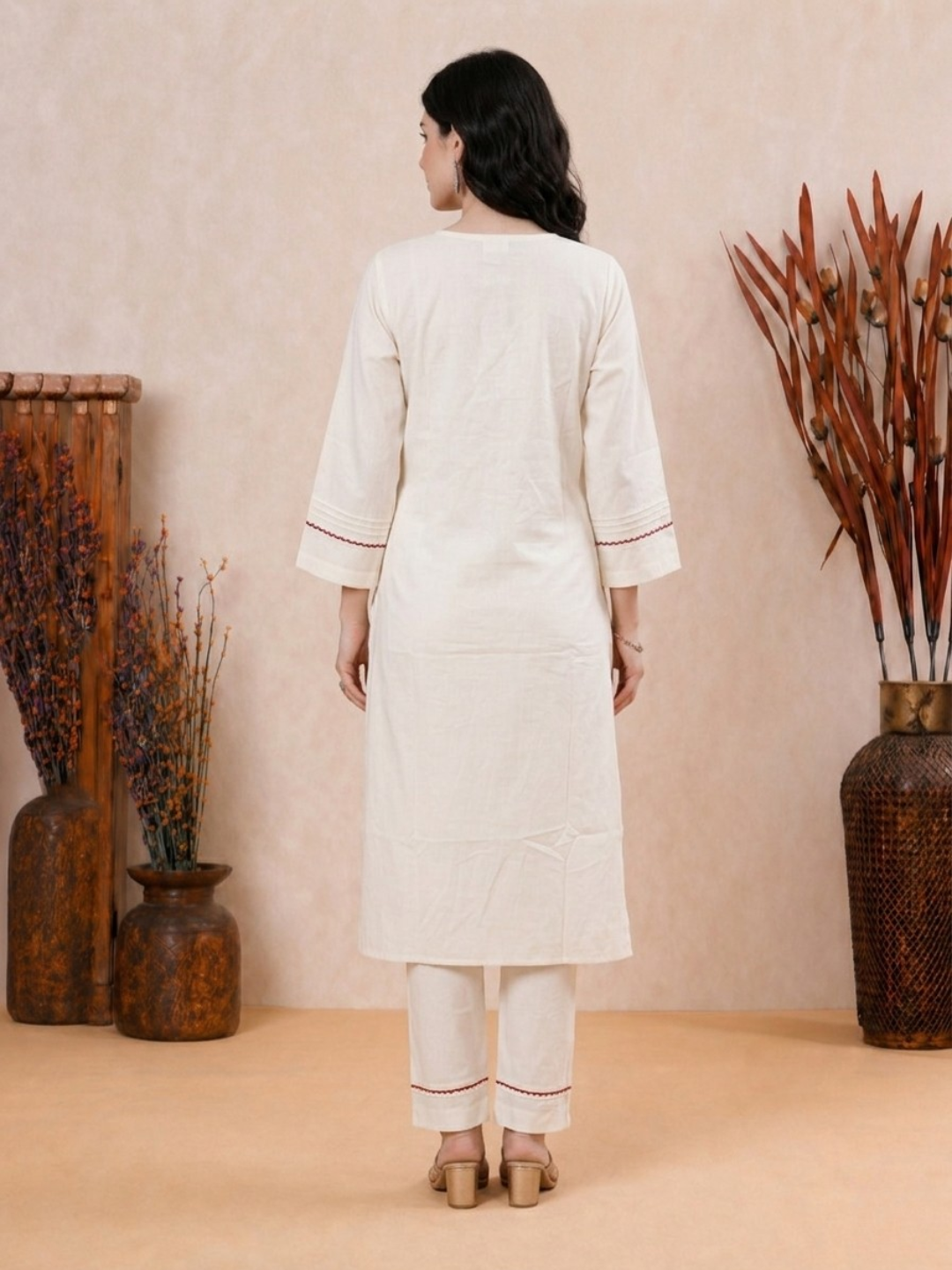 Woman wearing white Pakistani style coord set