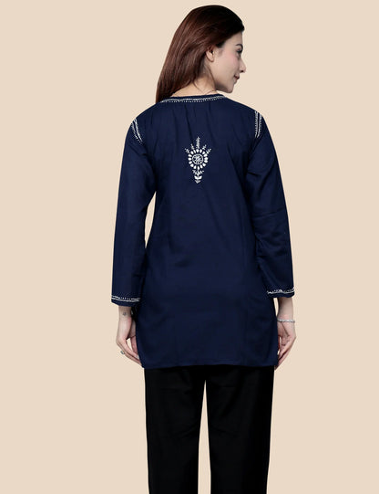 Woman wearing navy blue embroidered kurti