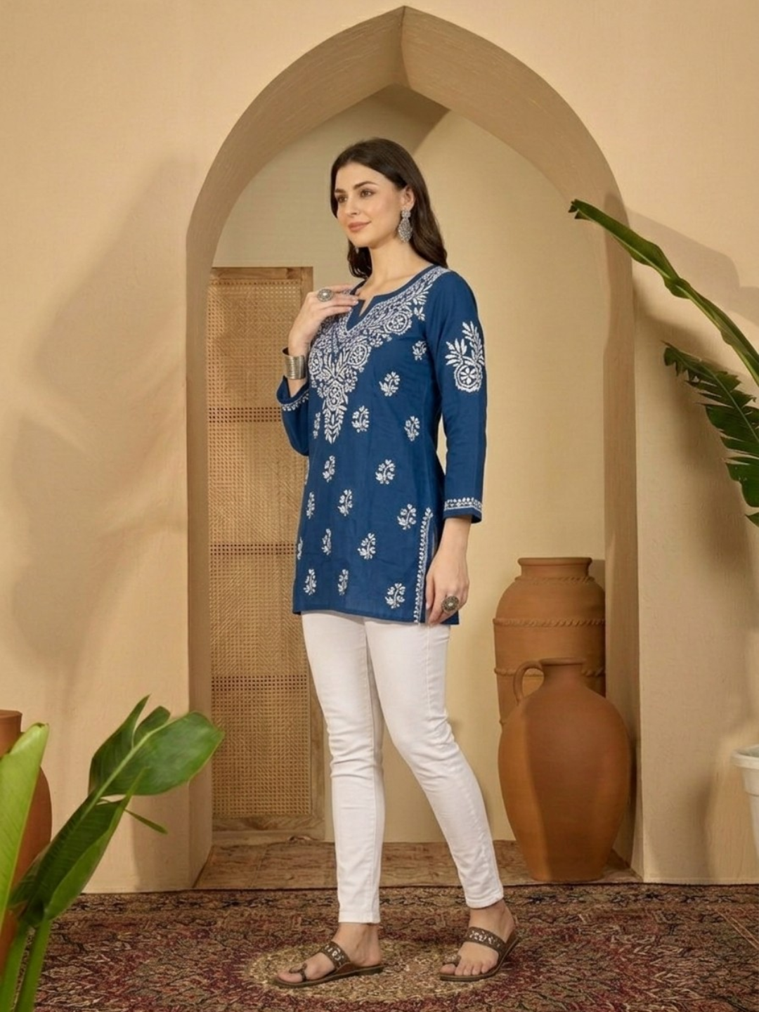 Woman wearing royal blue Lakhnavi embroidered kurti