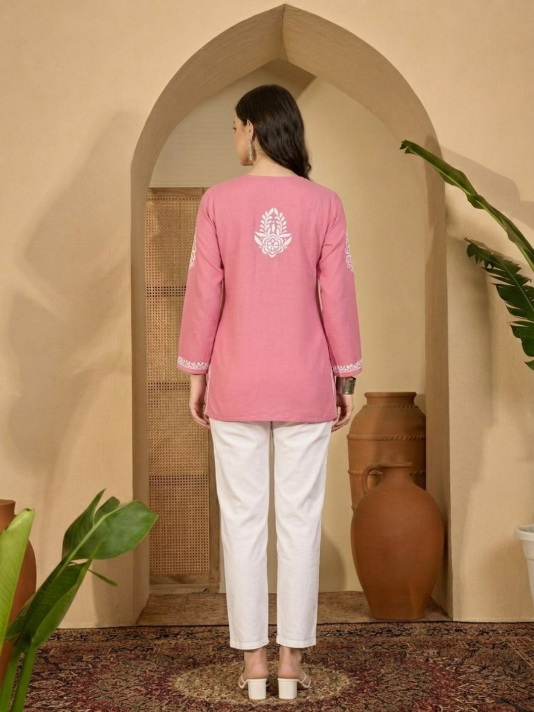 Woman wearing pink rayon Chikankari kurti