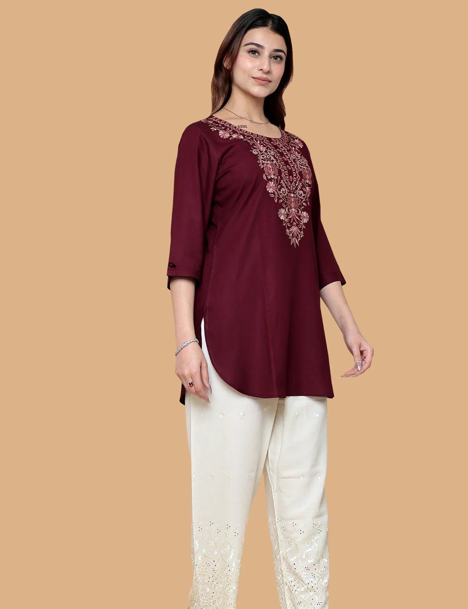 Woman wearing red printed short kurti