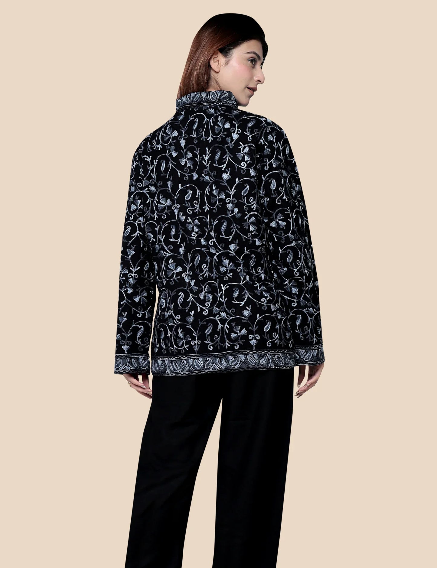 Woman wearing black woolen short coat