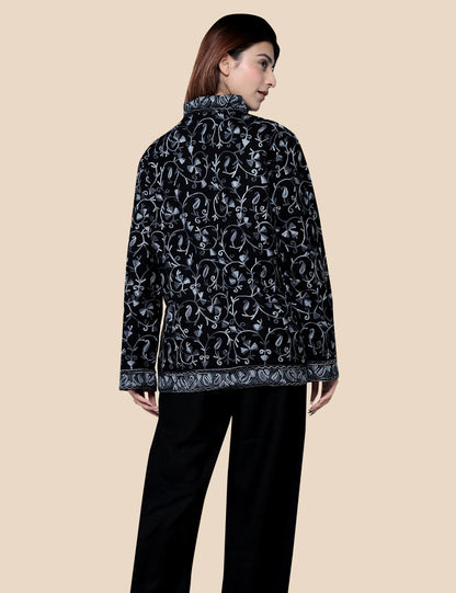 Woman wearing black woolen short coat