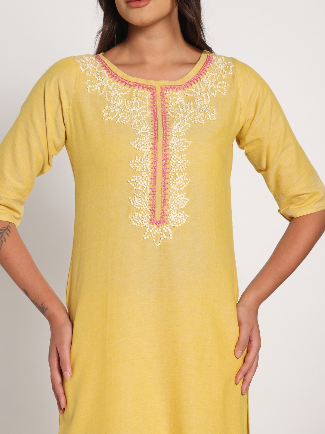 Yellow hand embroidered short kurti