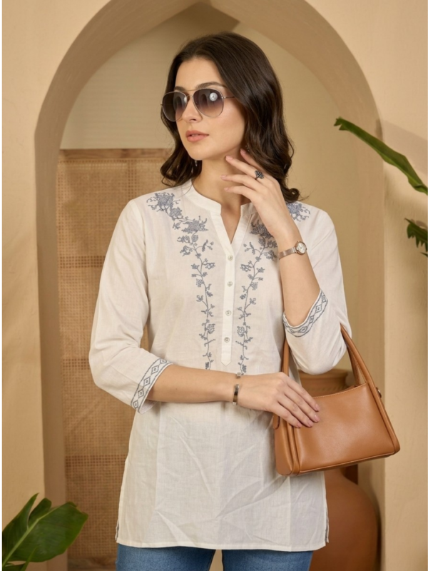 white embroidered short kurti